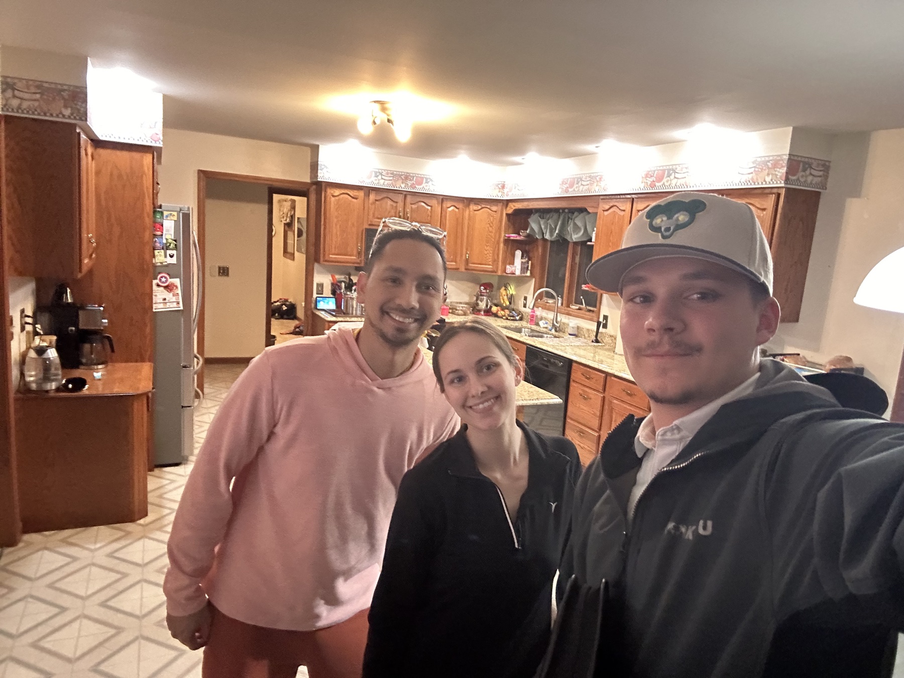 The Bunker Family giving a thumbs up after their solar review