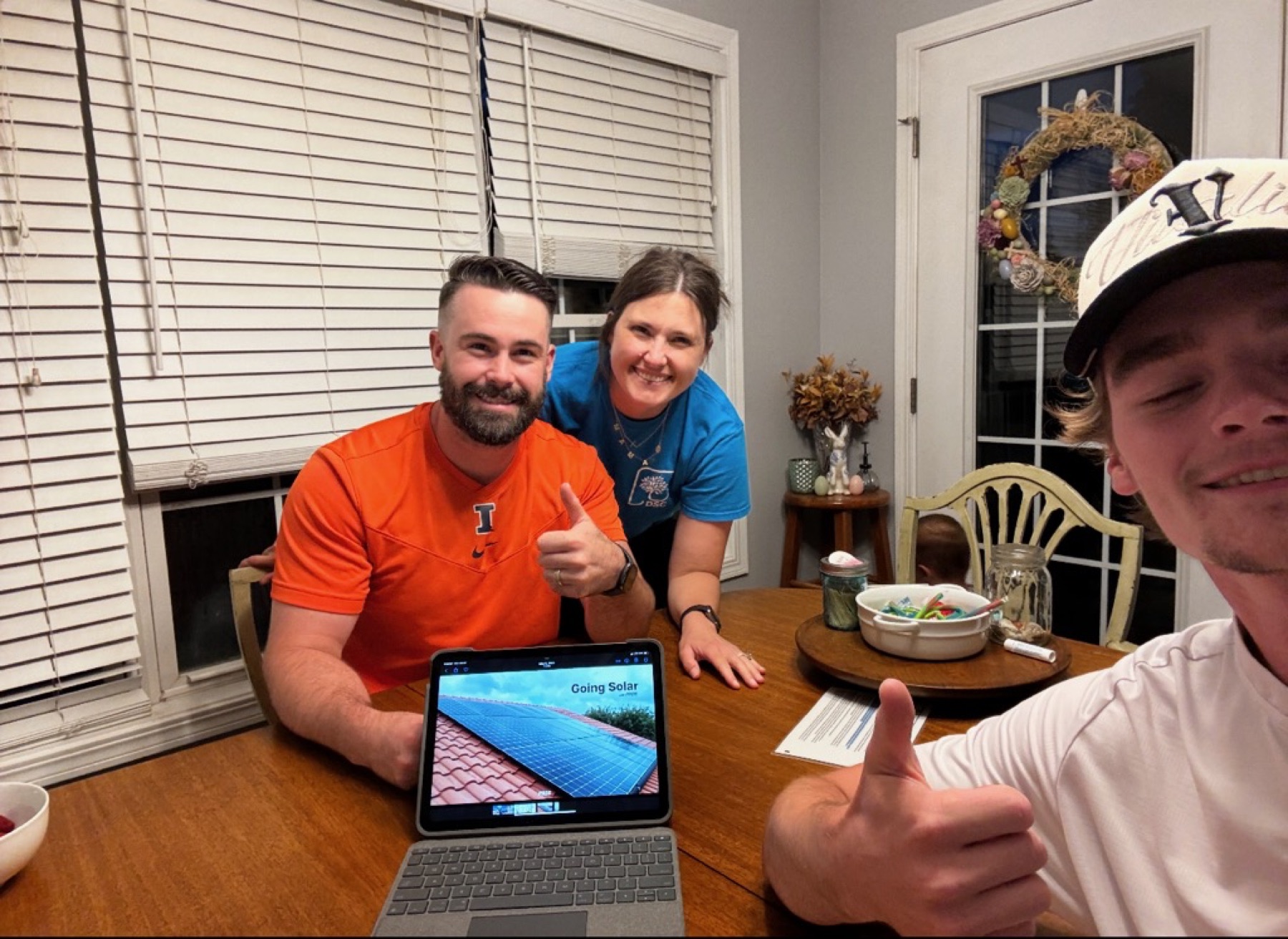 The Carr Family reviewing a solar presentation with Vitality